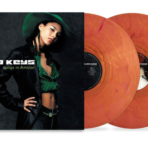 the album cover for Alicia Keys - Songs In A Minor - 25th Anniversary [Translucent Burnt Orange Marbled]