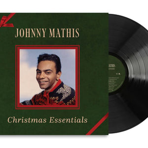 the album cover for Johnny Mathis - Christmas Essentials