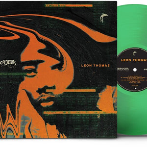 the album cover for Leon Thomas - Electric Dusk [Translucent Emerald Green LP]