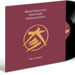 the album cover for Michel Petrucciani - Trio In Tokyo