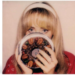 the album cover for Sabrina Carpenter - fruitcake [Milky Clear 12inch EP]