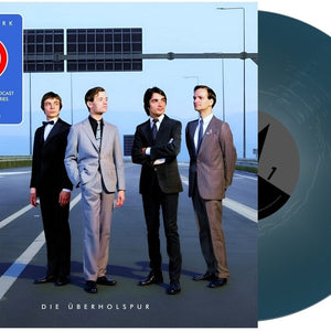 the album cover for Kraftwerk - 75 Die Uberholspur [Indie Exclusive] [Colored Vinyl] [Limited Edition] [Indie Exclusive]