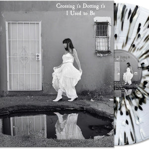the album cover for Crossing I's Dotting T's - I Used To Be [BLACK/WHITE/CLEAR SPLATTER]