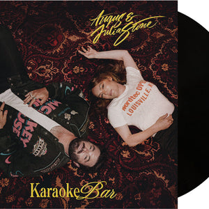 the album cover for Angus & Julia Stone - Karaoke Bar [Black]