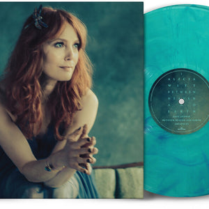 the album cover for Alicia Witt - Between Heaven and Earth