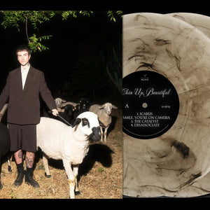 the album cover for Jutes - Chin Up Beautiful [Milky Black]