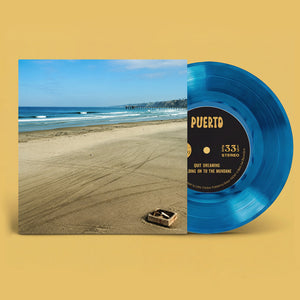 the album cover for Puerto - Quit Dreaming / Holding On To The Mundane (Blue)