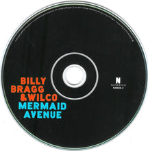 Load image into Gallery viewer, Billy Bragg And Wilco : Mermaid Avenue (The Complete Sessions) (CD, Album, RE + CD, Album, RE + CD, Album + DVD-V )
