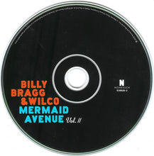 Load image into Gallery viewer, Billy Bragg And Wilco : Mermaid Avenue (The Complete Sessions) (CD, Album, RE + CD, Album, RE + CD, Album + DVD-V )
