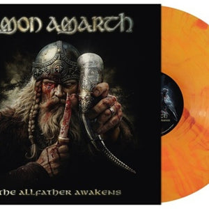the album cover for Amon Amarth - The Allfather Awakens [Indie Exclusive Yggdrasil Burns]