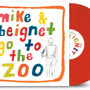 the album cover for Mike Dillon - Mike & Beignet Go to the Zoo