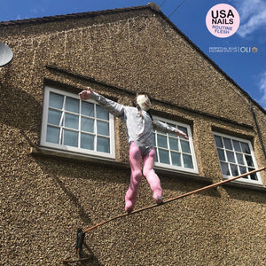 the album cover for USA Nails - Routine Flesh - Translucent Blue (Blue) [Colored Vinyl]